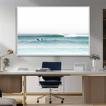 Minimalist photo of a lone surfer on calm aqua waves under bright sky, perfect for Scandinavian coastal or serene ocean-inspired home decor.