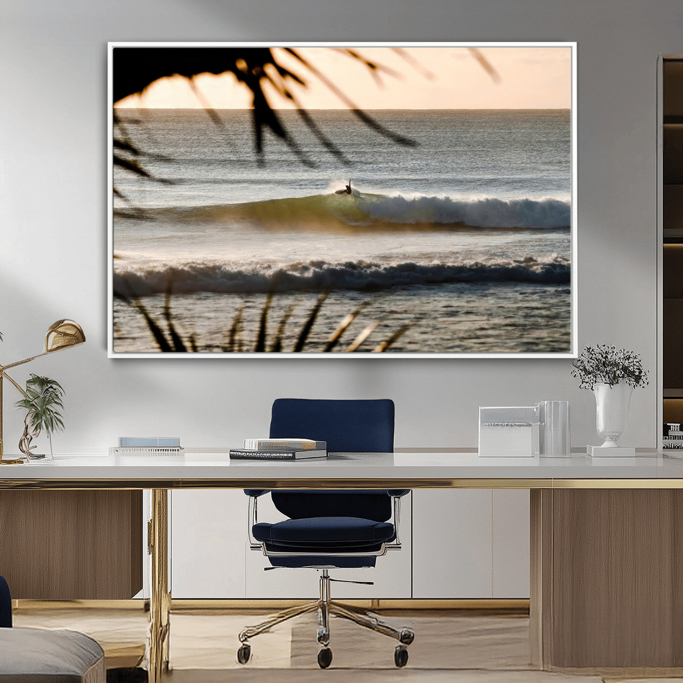 Photo of a surfer riding a golden hour wave at sunset, with tropical tones and dreamy light, perfect for tropical boho or coastal home decor.