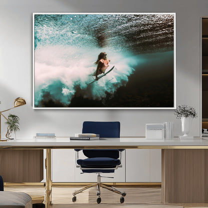 Vibrant underwater photo of a female surfer diving through turquoise waves, perfect for coastal boho or surf-inspired home decor.