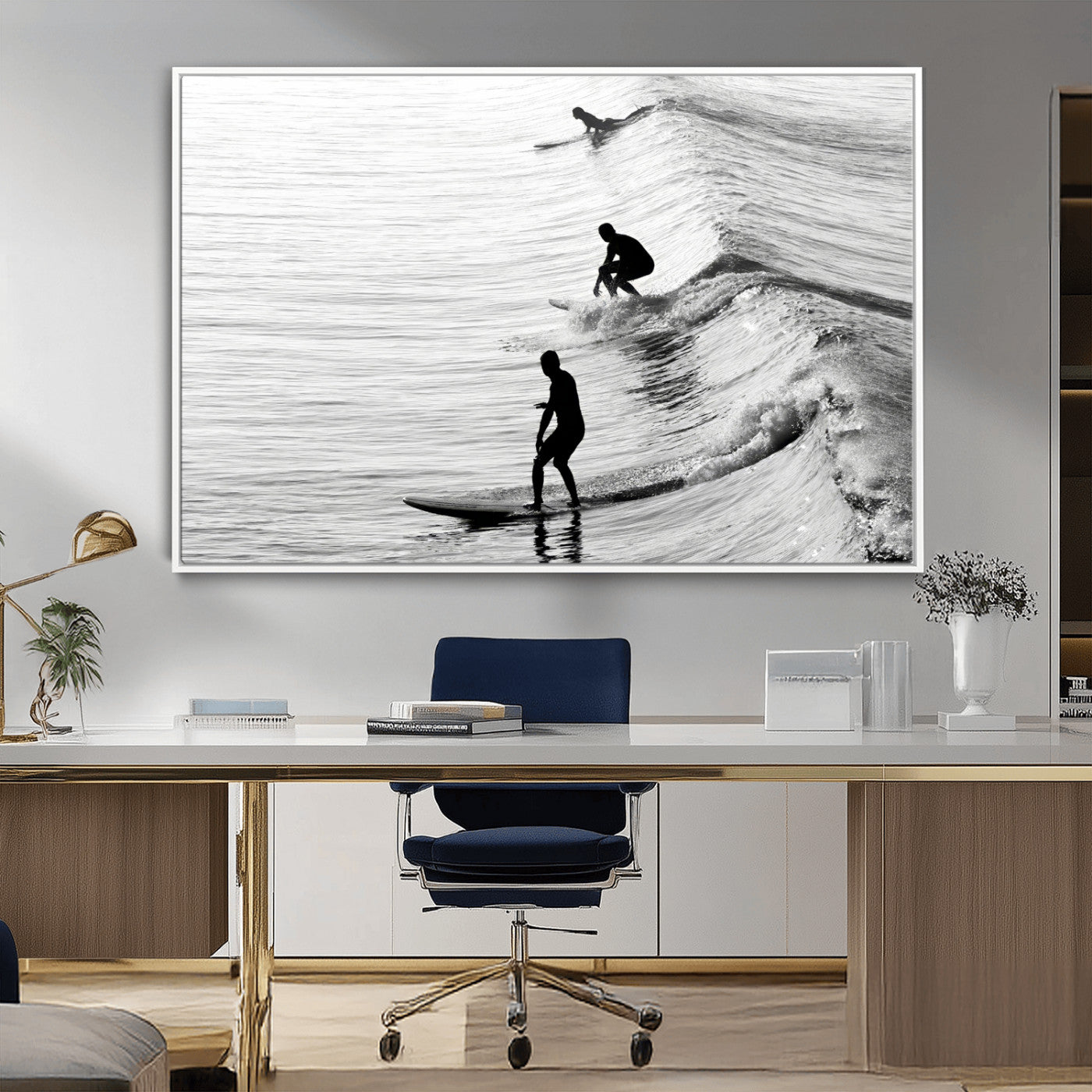 Black and white photo of surfers riding waves in a moody, high-contrast scene, ideal for modern coastal or surf-inspired home decor.