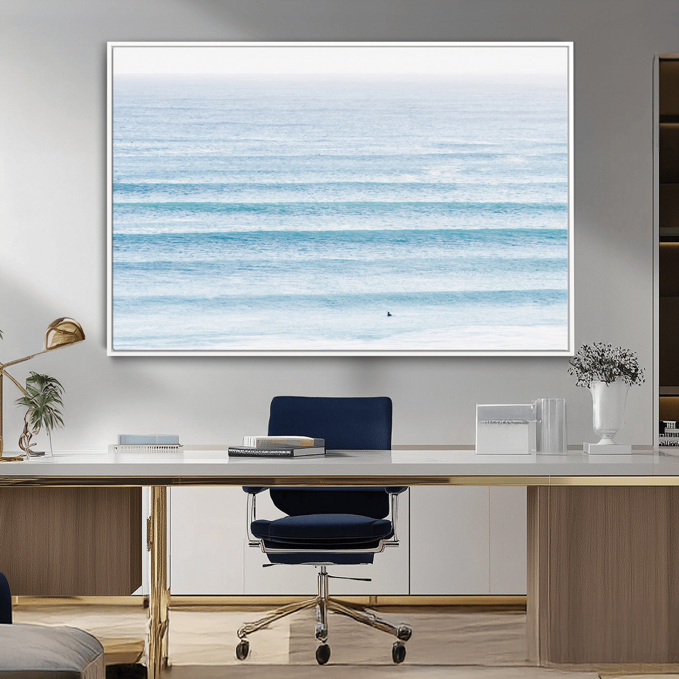 Minimalist ocean view with soft blue waves and a lone surfer, creating a serene and airy coastal aesthetic, perfect for tranquil home decor.