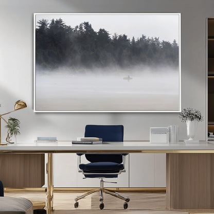 A lone surfer carrying a board through a misty shoreline, surrounded by dense trees and fog, creating a peaceful and mysterious coastal scene.