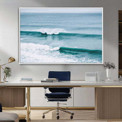 Powerful ocean waves rolling towards the shore, their turquoise hues blending with white sea foam under an open horizon, capturing the essence of the ocean's movement.