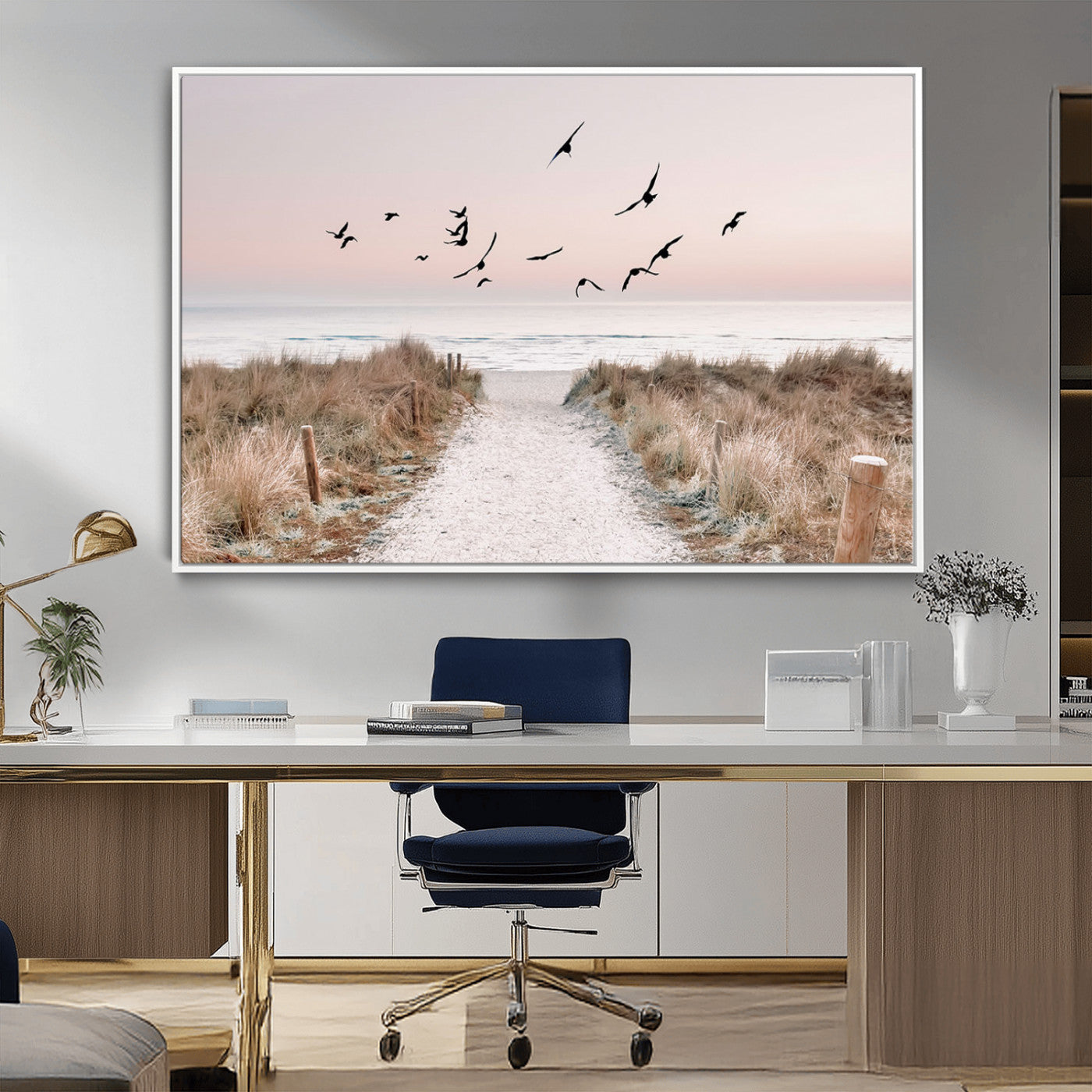 A peaceful coastal pathway leading to the ocean, with birds flying across a soft pastel sky, creating a calm and scenic beach atmosphere.