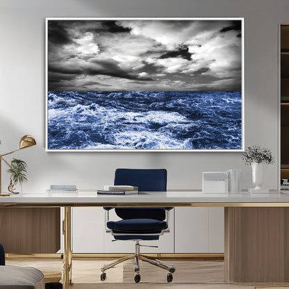 Moody canvas wall art of a stormy ocean under a dramatic black-and-white sky, perfect for bold or coastal-style interiors.