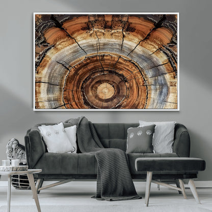 Canvas of tree rings and natural wood grain in earthy tones, ideal for rustic or vintage-inspired home decor with organic textures.