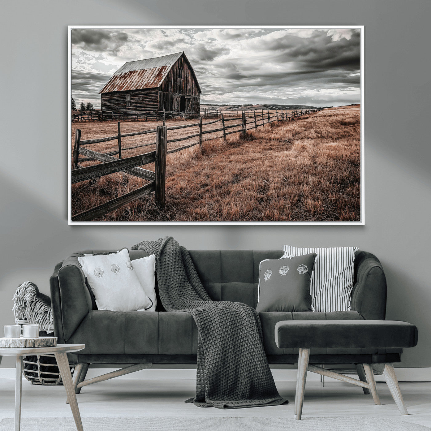 Framed canvas of a rustic barn under a moody sky with weathered fence and dark fields, ideal for farmhouse or rural-style wall decor.