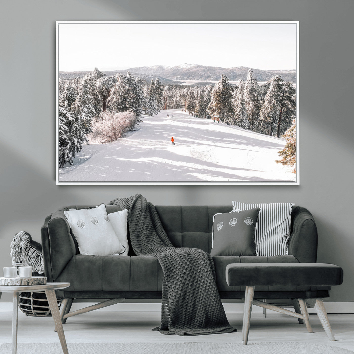 Bright ski trail lined with snow-covered pines and a skier in orange, perfect for alpine adventure or winter sports-inspired decor.
