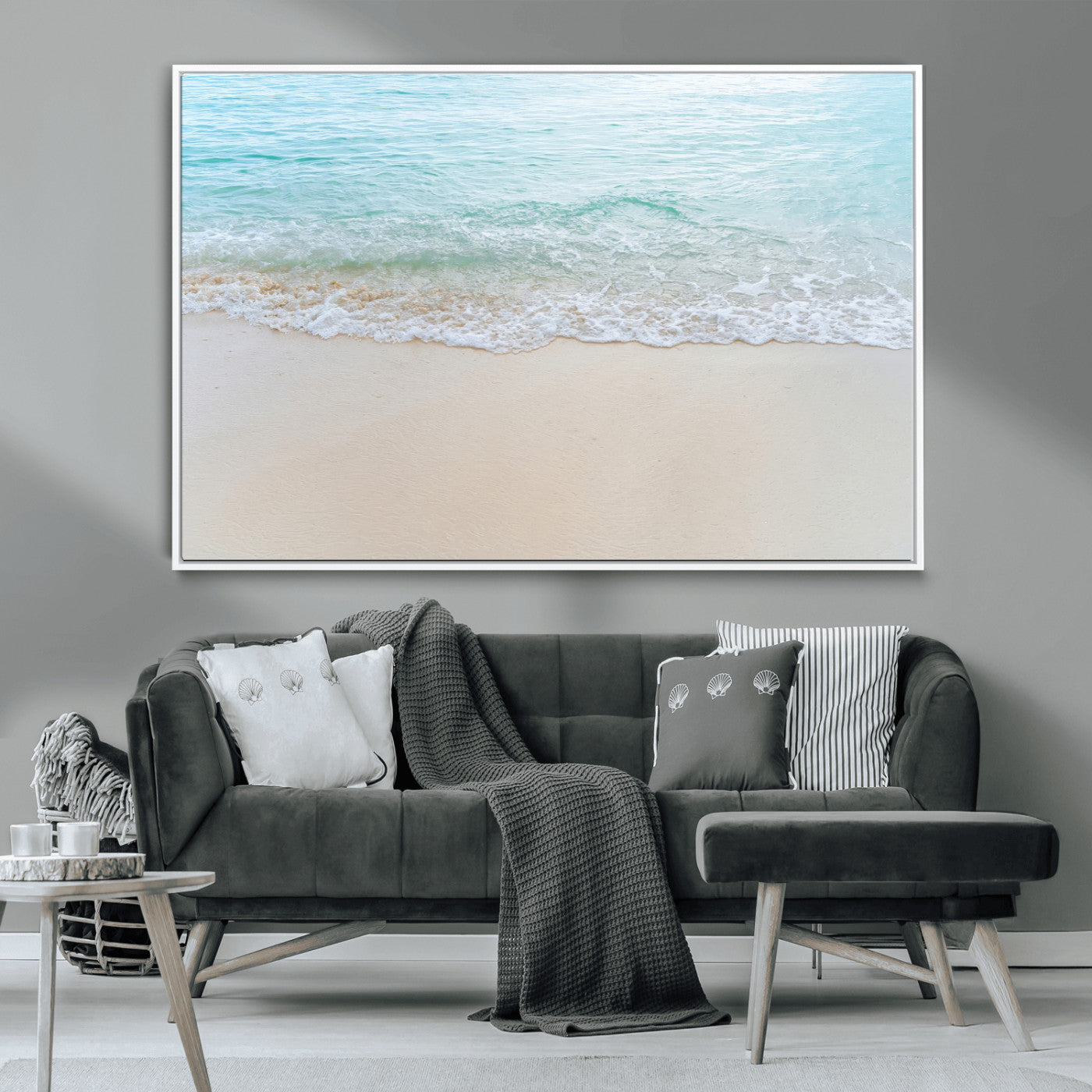 Soft shoreline with gentle aqua waves on smooth sand, ideal for minimalist coastal or pastel ocean-inspired home wall decor.