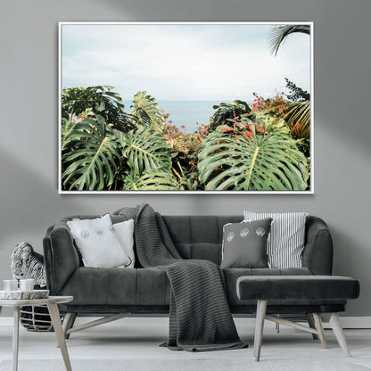 Monstera leaves and tropical flowers framing a calm ocean view, ideal for tropical coastal or exotic jungle-style interior wall decor.