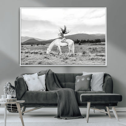 Black and white photo of a woman on a white horse in moody tones, ideal for Western Boho or modern rustic-style home decor.