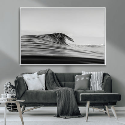 Striking black and white photo of a curling wave, ideal for modern coastal or minimalist wall decor settings.