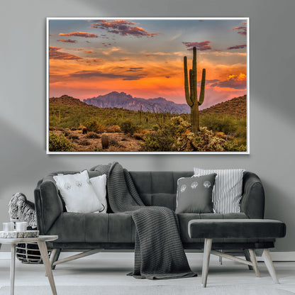 Vibrant desert sunset with saguaro cacti and distant mountains, perfect for Southwestern or warm-toned home decor.