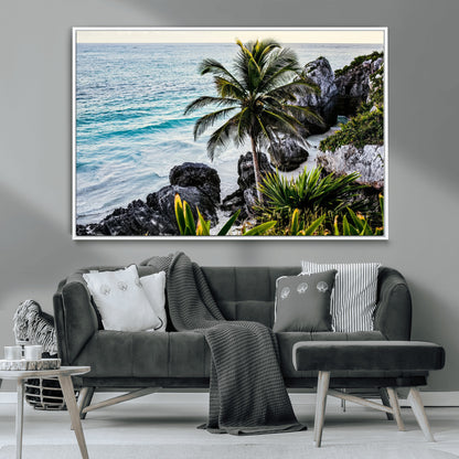 Framed canvas of a vibrant tropical coastline with palm trees, rocky cliffs, and turquoise waters, ideal for tropical coastal home decor.