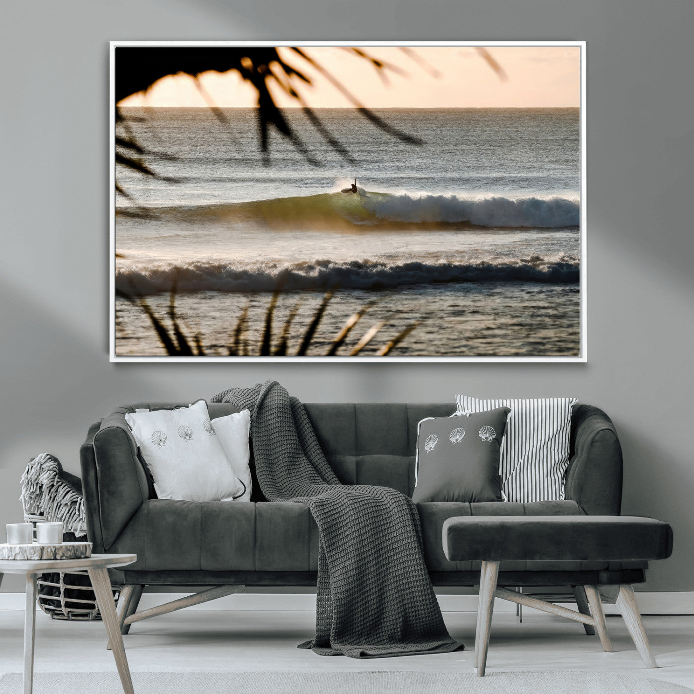 Photo of a surfer riding a golden hour wave at sunset, with tropical tones and dreamy light, perfect for tropical boho or coastal home decor.
