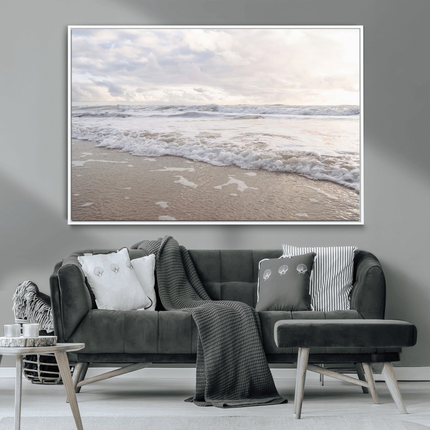 Peaceful ocean waves rolling onto the sandy shore under soft light, perfect for neutral or coastal minimalist decor themes.