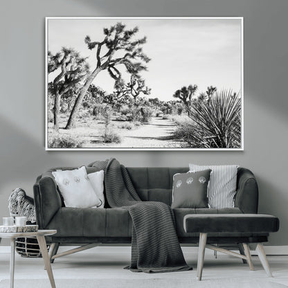 Canvas of a Joshua Tree forest in black and white tones, featuring a desert path and spiky vegetation, ideal for minimalist or rustic decor.