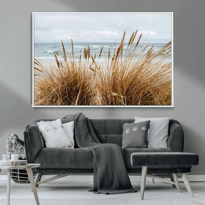 Canvas of golden beach grass swaying by the ocean under a soft cloudy sky, perfect for neutral-toned or coastal minimalist decor.