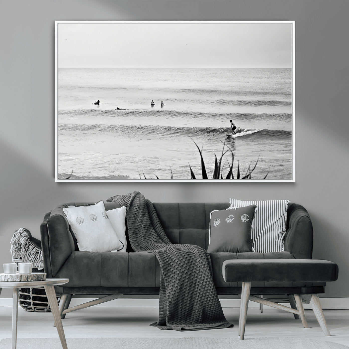 Monochrome canvas of surfers on calm ocean waves, ideal for minimalist coastal or beach-inspired interior decor.