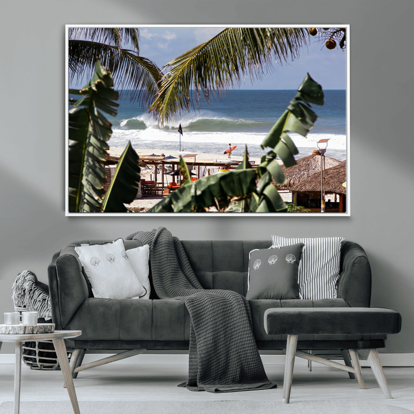 Canvas wall art of a tropical surf scene framed by palm trees, with a surfer on the shore and waves rolling in, ideal for beach-themed decor.