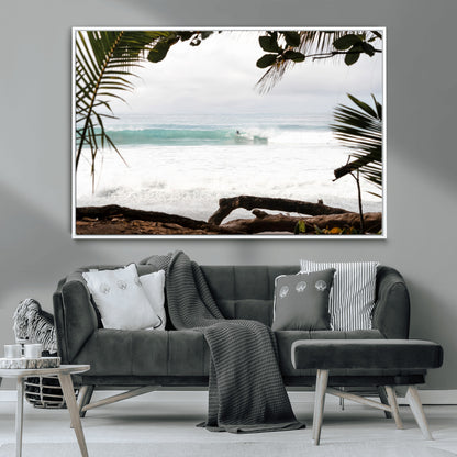 Tropical beach view with palm trees and surfer riding a wave, perfect for boho or coastal-inspired interior wall decor.