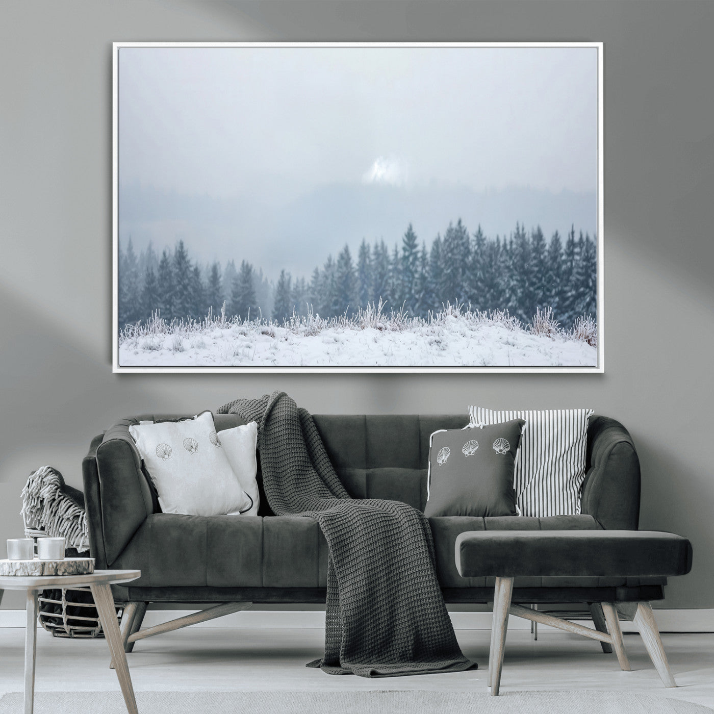 Snow-covered forest under misty sky, soft light breaking through clouds, ideal for minimalist or Nordic-inspired home decor.