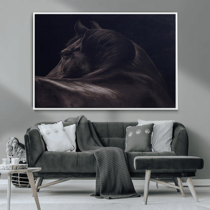 Close-up of a black horse with dramatic lighting on a dark background, perfect for rustic or masculine home decor.