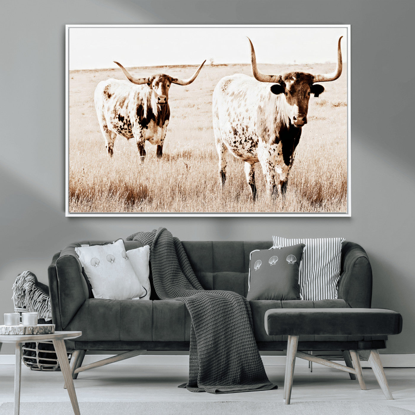 Two Texas longhorn cows standing in a sepia-toned pasture, evoking rustic charm perfect for farmhouse or western country interiors. (