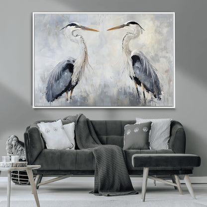 Two herons facing each other on a soft-toned background with blue-grey feathers, perfect for tranquil, coastal or nature-themed interiors.
