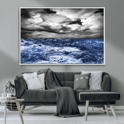 Moody canvas wall art of a stormy ocean under a dramatic black-and-white sky, perfect for bold or coastal-style interiors.