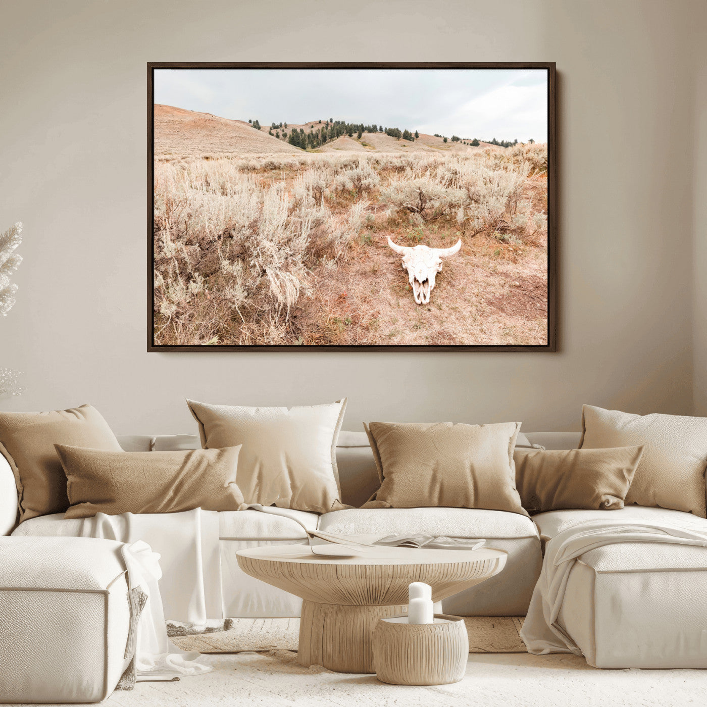 Rustic bull skull on dry sagebrush field under soft light, ideal for western minimal or desert prairie-style wall decoration.