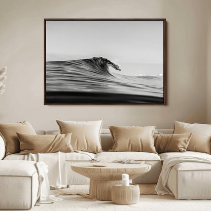 Striking black and white photo of a curling wave, ideal for modern coastal or minimalist wall decor settings.