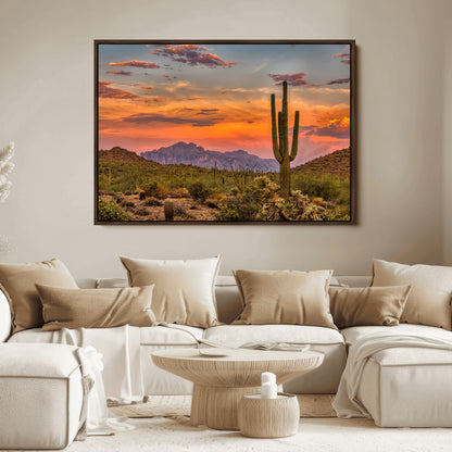 Vibrant desert sunset with saguaro cacti and distant mountains, perfect for Southwestern or warm-toned home decor.