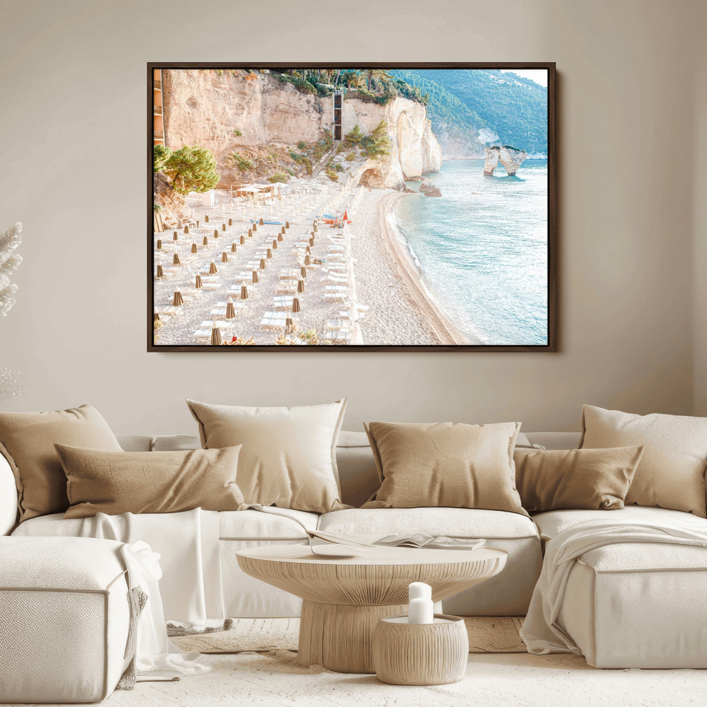 Wall art of a calm Mediterranean beach with rows of sun loungers and umbrellas in soft pastel tones, perfect for light coastal or vacation-themed decor.
