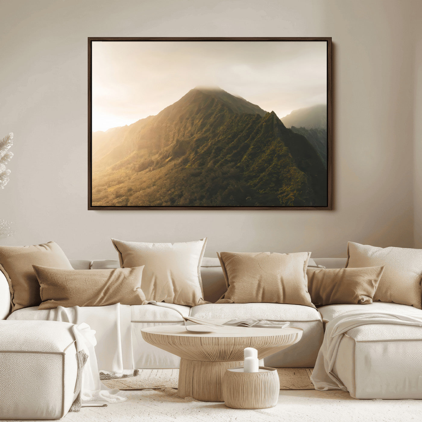 Sunlit mountain peak with mist rolling over its rugged slopes, bathed in golden light, creating a warm and tranquil nature-inspired scene.