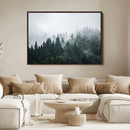 A misty evergreen forest shrouded in soft fog, creating a tranquil and moody landscape with lush green trees fading into the distance.