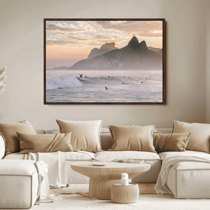 A surfer rides a golden hour wave near misty coastal mountains, surrounded by fellow surfers, capturing the spirit of a coastal adventure.