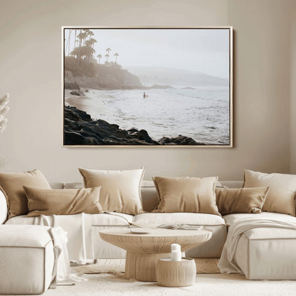 Framed canvas of a surfer in misty coastal tones at a foggy California beach, ideal for minimalist coastal beach or serene ocean-themed decor.