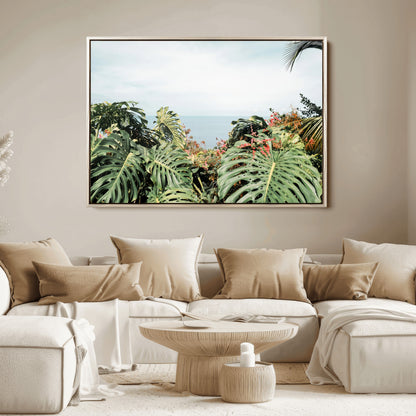 Monstera leaves and tropical flowers framing a calm ocean view, ideal for tropical coastal or exotic jungle-style interior wall decor.