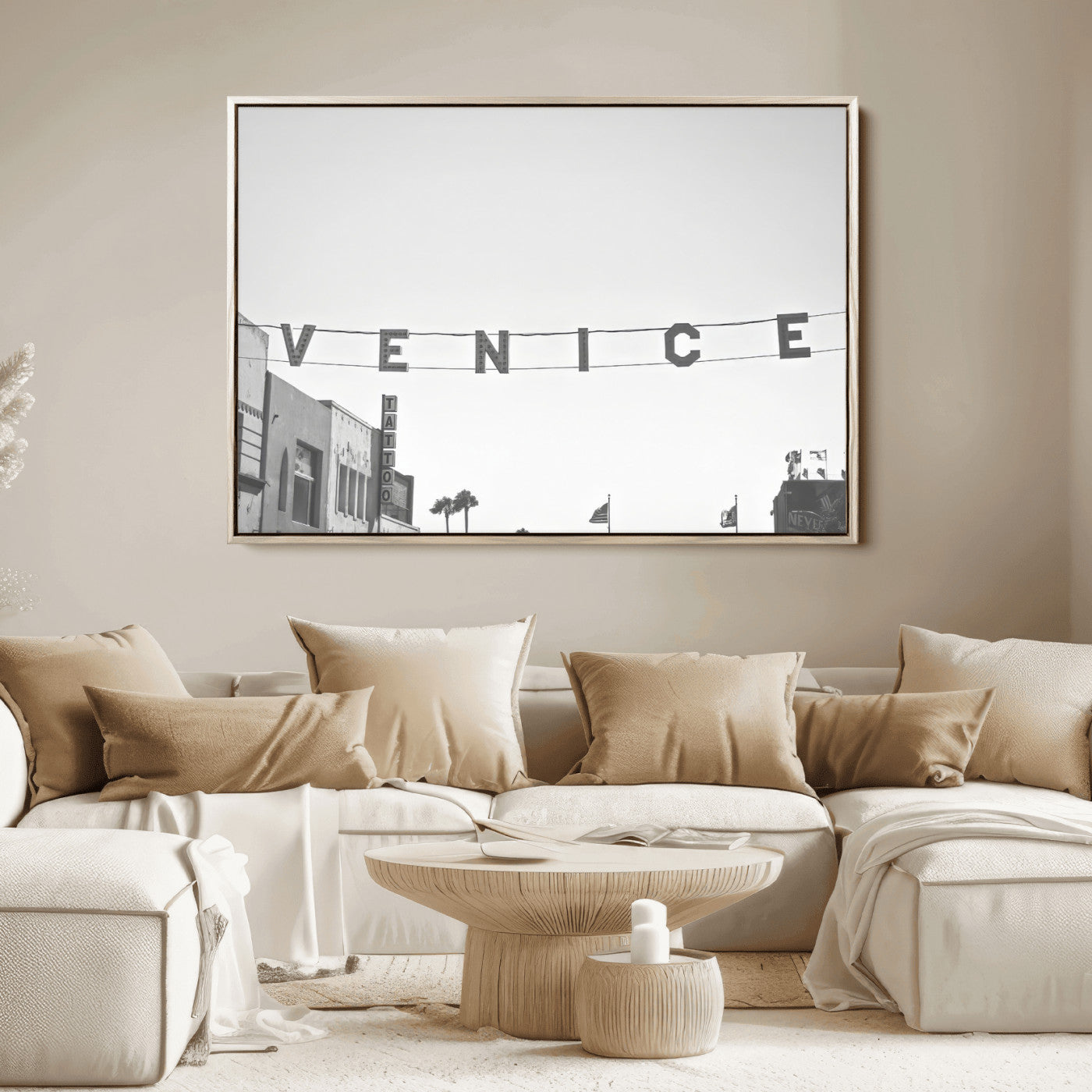 Black and white photo of Venice Beach sign and palm-lined street, perfect for urban coastal or minimalist LA-inspired wall decoration.