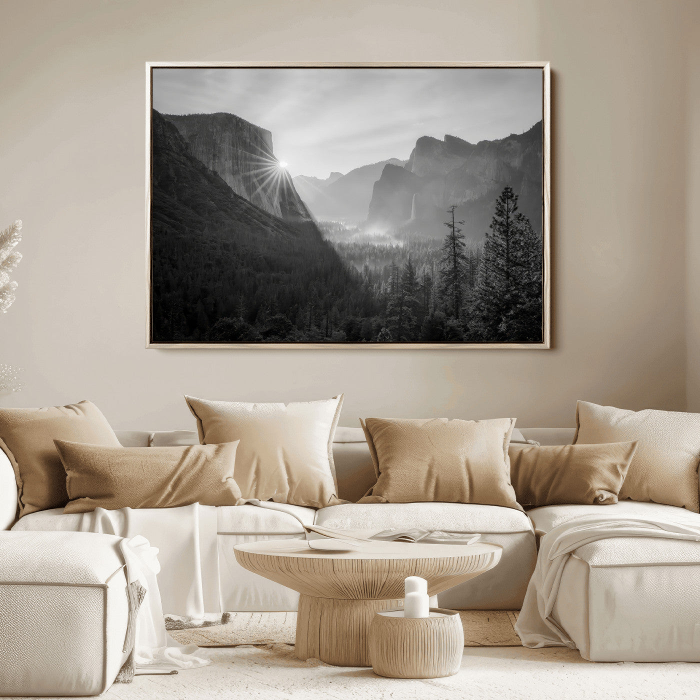 Black and white landscape of Yosemite with sun rays peeking over El Capitan, ideal for moody nature or modern rustic decor.