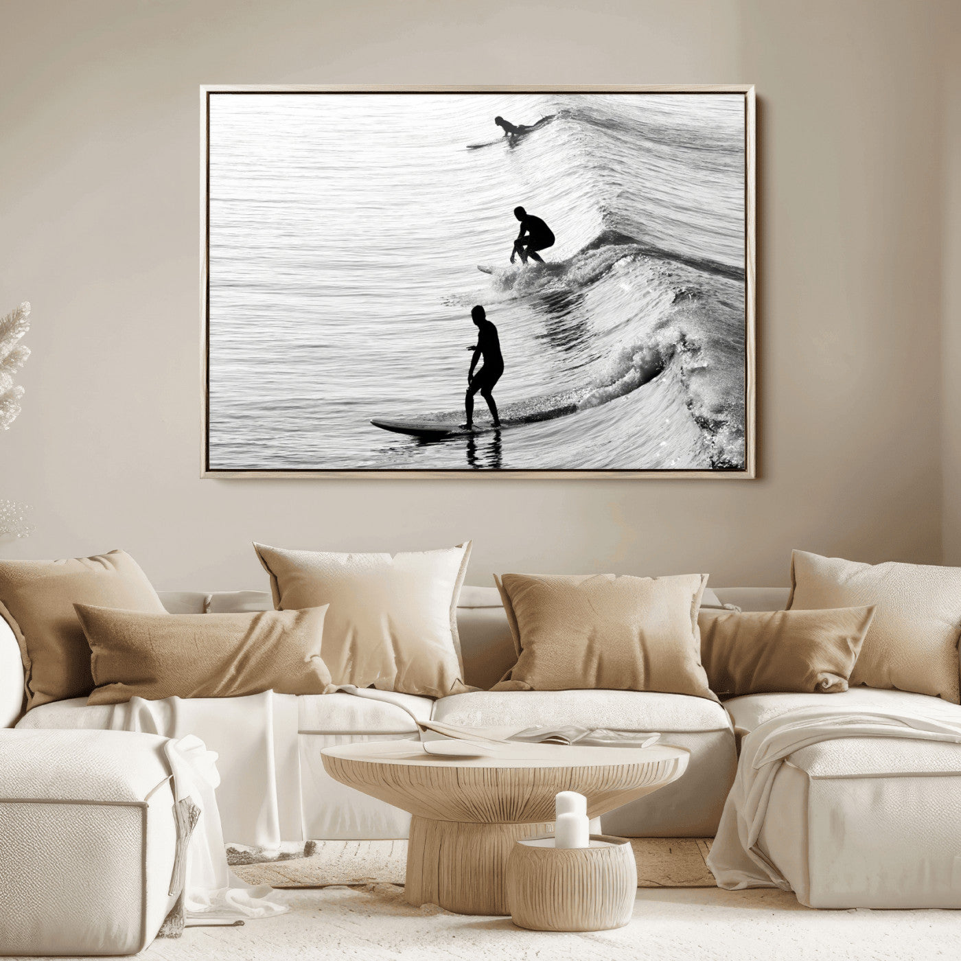 Black and white photo of surfers riding waves in a moody, high-contrast scene, ideal for modern coastal or surf-inspired home decor.