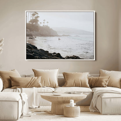 Framed canvas of a surfer in misty coastal tones at a foggy California beach, ideal for minimalist coastal beach or serene ocean-themed decor.