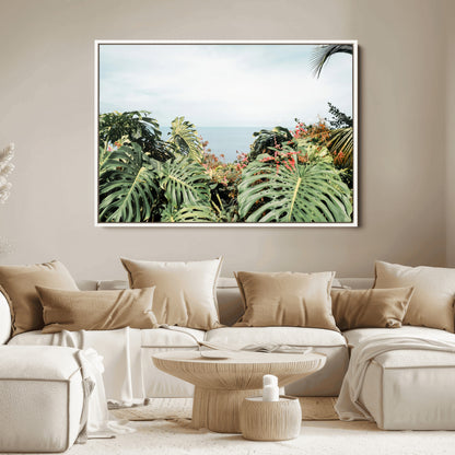 Monstera leaves and tropical flowers framing a calm ocean view, ideal for tropical coastal or exotic jungle-style interior wall decor.