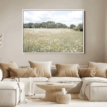 Soft-toned image of a wild daisy field under a cloudy sky, ideal for neutral or Scandinavian-inspired home decor.