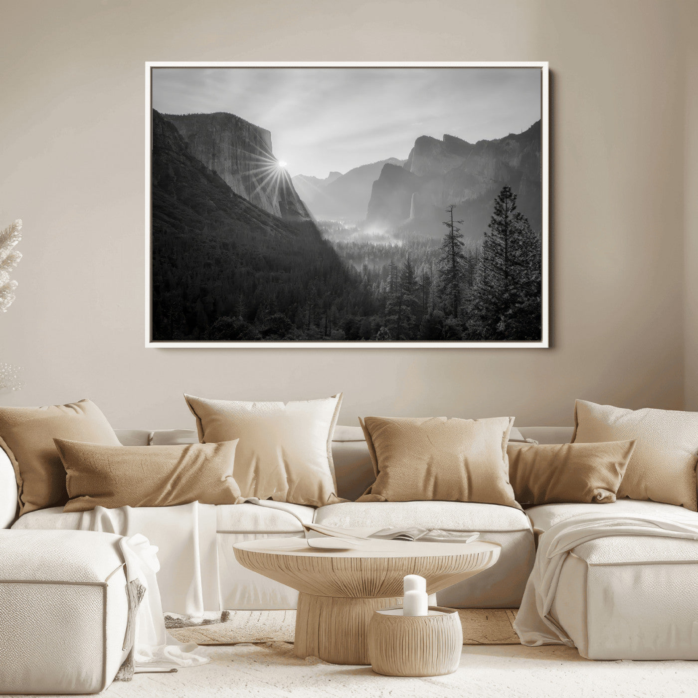 Black and white landscape of Yosemite with sun rays peeking over El Capitan, ideal for moody nature or modern rustic decor.