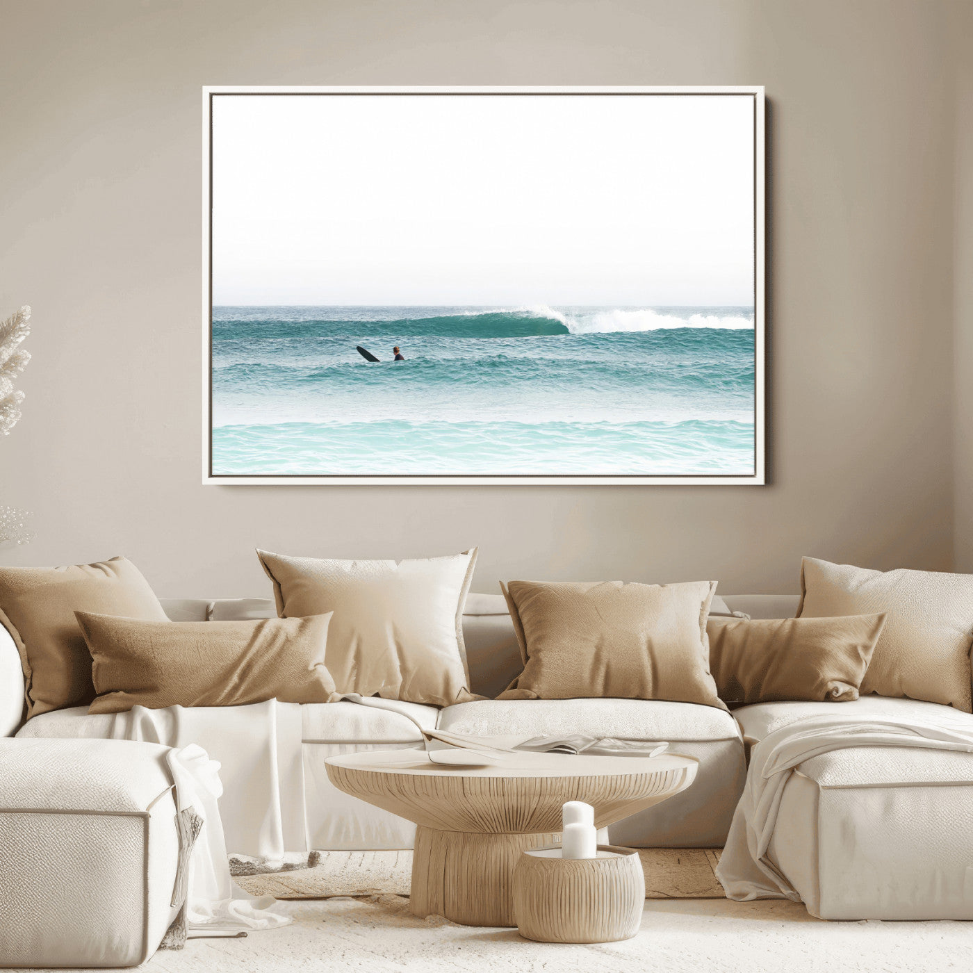 Minimalist photo of a lone surfer on calm aqua waves under bright sky, perfect for Scandinavian coastal or serene ocean-inspired home decor.