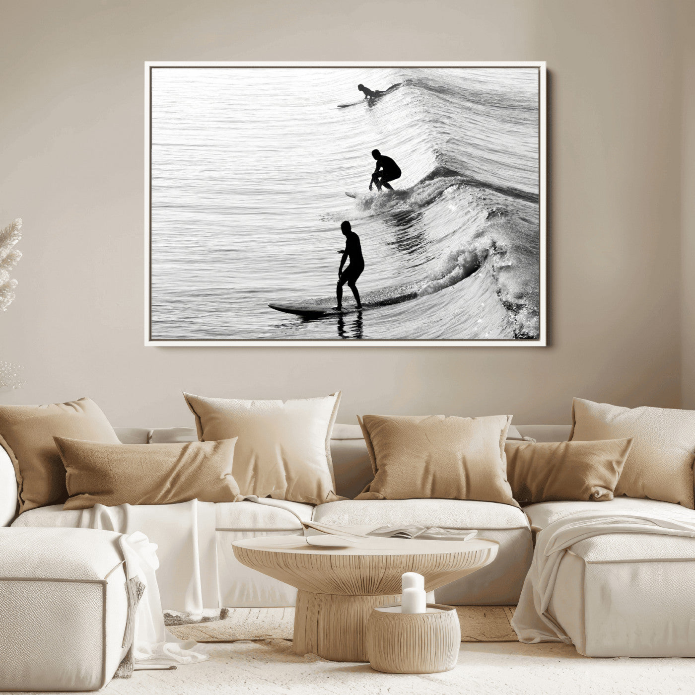 Black and white photo of surfers riding waves in a moody, high-contrast scene, ideal for modern coastal or surf-inspired home decor.