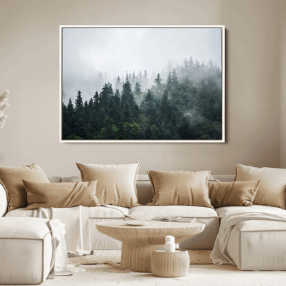 A misty evergreen forest shrouded in soft fog, creating a tranquil and moody landscape with lush green trees fading into the distance.