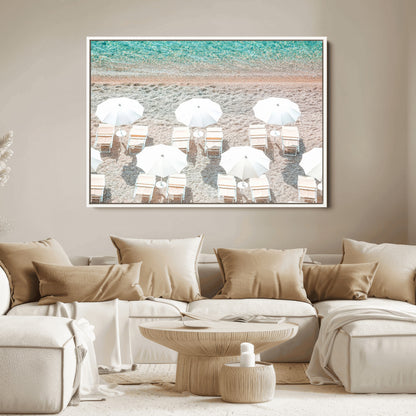 A bright beach scene with white umbrellas, pastel sand, and turquoise waters, creating a tranquil coastal vibe, perfect for beach house or summer decor.